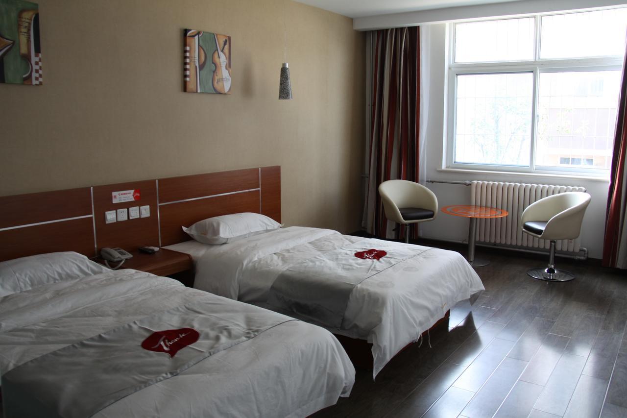 Thank Inn Chain Hotel Shandong Liaocheng Economic Development Zone Jiuhe Community Bagian luar foto